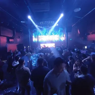 a large group of people dancing