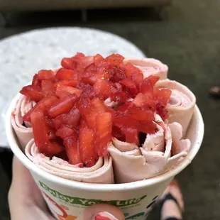 Chocolate ice cream with strawberry topping