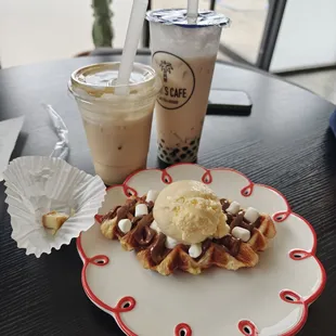 Pistachio coffee, milk tea boba, and a Nutella and marshmallow craffle. We added ice cream to it