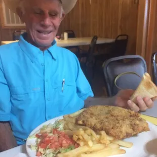 Big dinner .  Hi ken fries steak f the birthday  boy