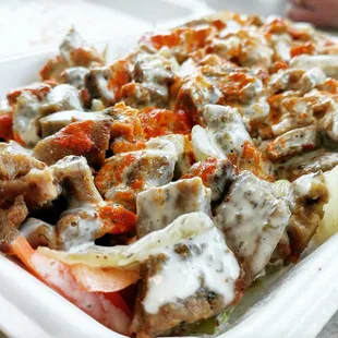 Mix over rice (chicken and lamb) with both sauces. Delicious.