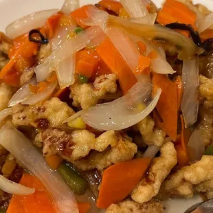 a plate of stir fried vegetables