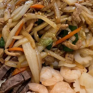 a plate of stir fried vegetables