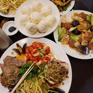 Cold appetizer dish. Meatballs. Salt and pepper fried eggplant. Yellow chives with pork. Steam buns.