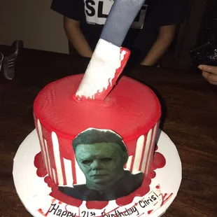 a cake with a knife sticking out of it