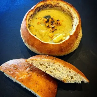 Roasted Poblano Corn Chowder house-made scratch. Served in our house from made Italian rosemary bread bowl.