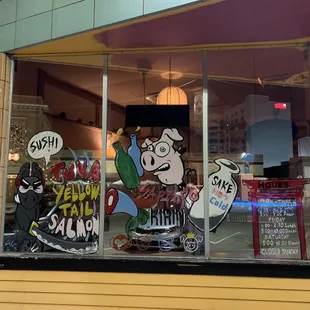 The front windows are festively decorated.