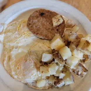 Yoolks combination breakfast  2 eggs  hash browns and sausage