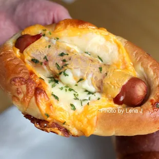 American Cheese Sausage Bread ($2.80) - bread with a hot dog, cheese, and some onion inside