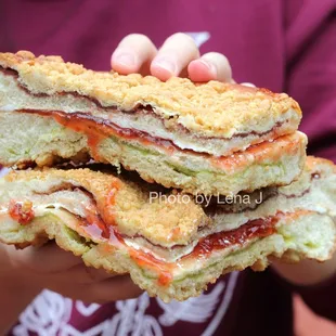 Inside of Mammoth Bread - quite sweet, with peanut butter crumbles on top. Inside has red and green bean pastes, cream, strawberry jam.