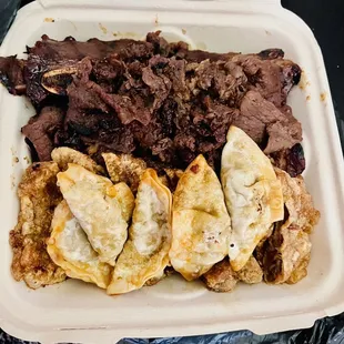 Family feast meats of bulgogi, Kalbi, mandoo, chicken