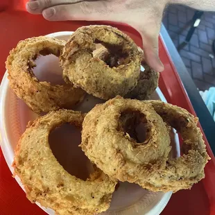 Massive onion rings- hand to scale