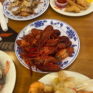 lobsters, crab legs, and other seafood dishes
