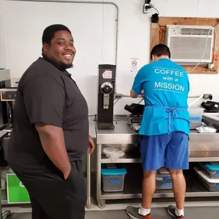 two men in a kitchen