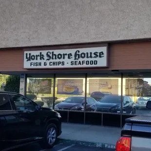 They are in the building behind BK on the west side of the road. Entrance is on the south side.