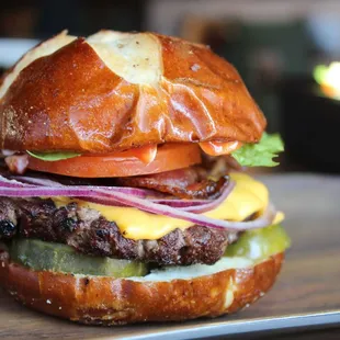 a burger on a wooden board