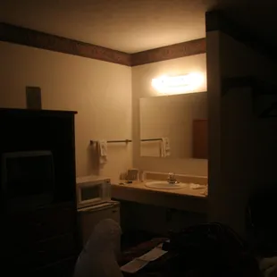 sink, fridge in basement single room