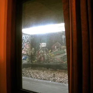 Doesn&apos;t matter if you paint on the concrete; the window still looks out into a gutter.