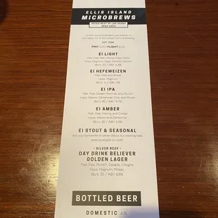 a beer menu on a table