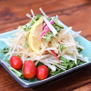 Daikon Salad ($8) - shredded daikon radish, mizuna, yuzu vinaigrette