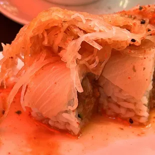 a sushi roll on a plate