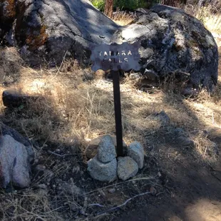 This is the little sign where there is a trail to the wading areas along the creek.