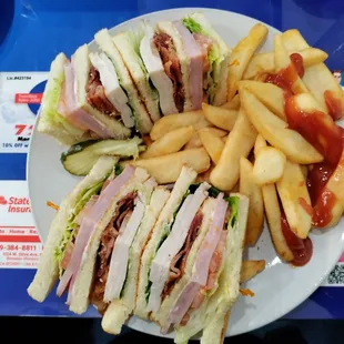 Club sandwich and fries