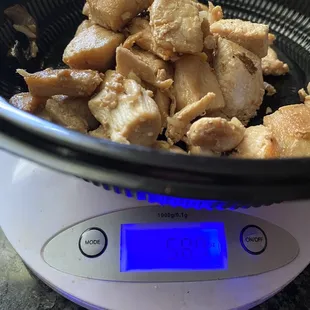 5.87 ounces of chicken  12 ounces of fried rice