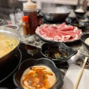 Peanut dipping sauce and miso hot pot