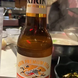a bottle of beer on a table