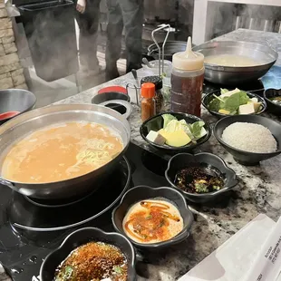 Miso base with spice, veggies and 3 dipping sauces.