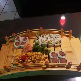 Spicy Tuna roll (upper left and lower right corners)  Lobster roll (lower left)  Spicy Octopus (upper right)