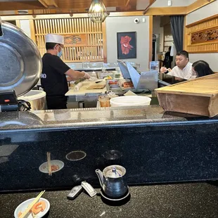 a group of people preparing food