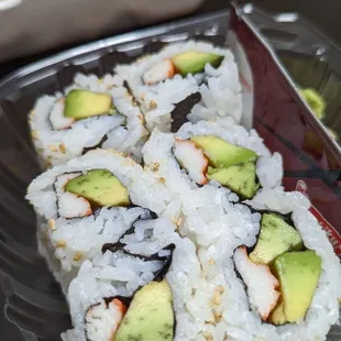 Lunch combination A: 6 piece California roll and sesame chicken