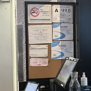 a table with a laptop and phone