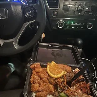 a tray of food in a car