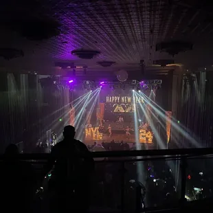 a stage with a band performing