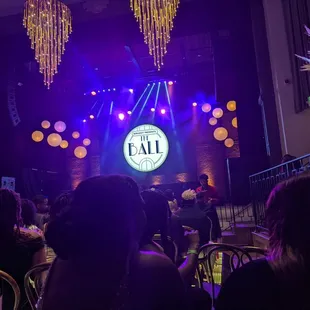 a stage with a large clock