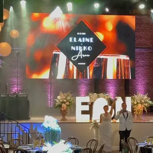 a man standing in front of a stage