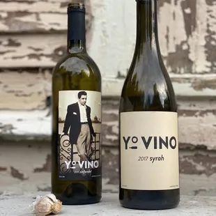 two bottles of wine and a cork