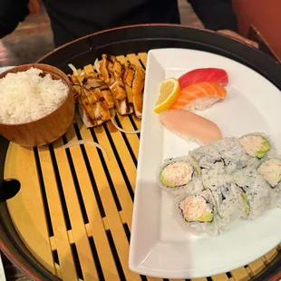 4 piece sashimi, ca roll, salad, rice and grilled chicken teriyaki
