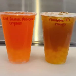 Red Guava Refresher with Crystal boba
Pineapple Fruit Tea with Mango boba