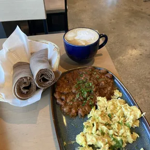 Ful and Eggs with Injera, and a soymilk vanilla latte. Absolutely addicting.