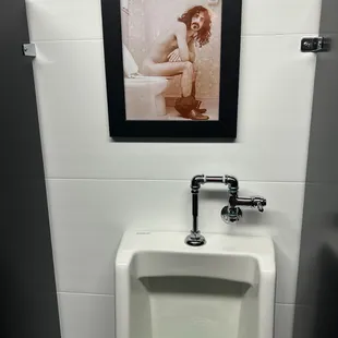 In the mens bathroom