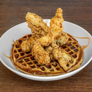 Our Chicken &amp; Pretzel Waffle 
Malt powder and pretzels mixed into this fluffy waffle, served under maple brined fried chicken.