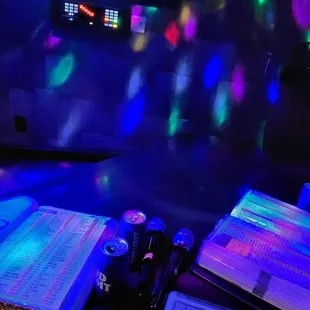 a desk with a keyboard, mouse, and monitor