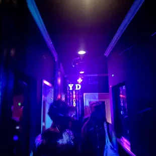 Walking down the colorful hallway to our karaoke room!