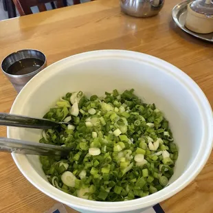 Big bucket of green onions