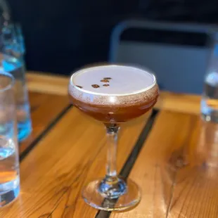 a drink on a wooden table