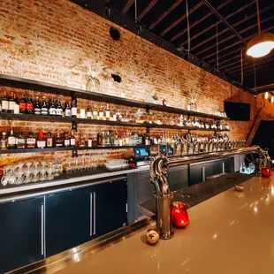 a bar with shelves of liquor